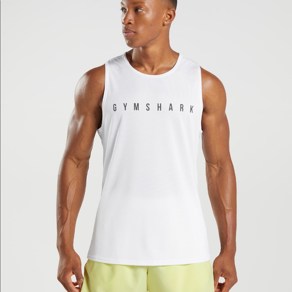 White Gymshark Mens tank. M. New with tags. Never worn. In original bag.